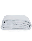 Nimbus Folded light gray blanket on a white background